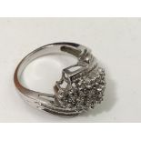 A 9ct white gold ring set with diamonds.Approx siz