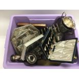 A box of silver plated items.