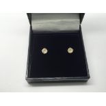A pair of 9ct gold and rutile ear studs, approx 0.