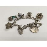 A sterling silver charm bracelet.