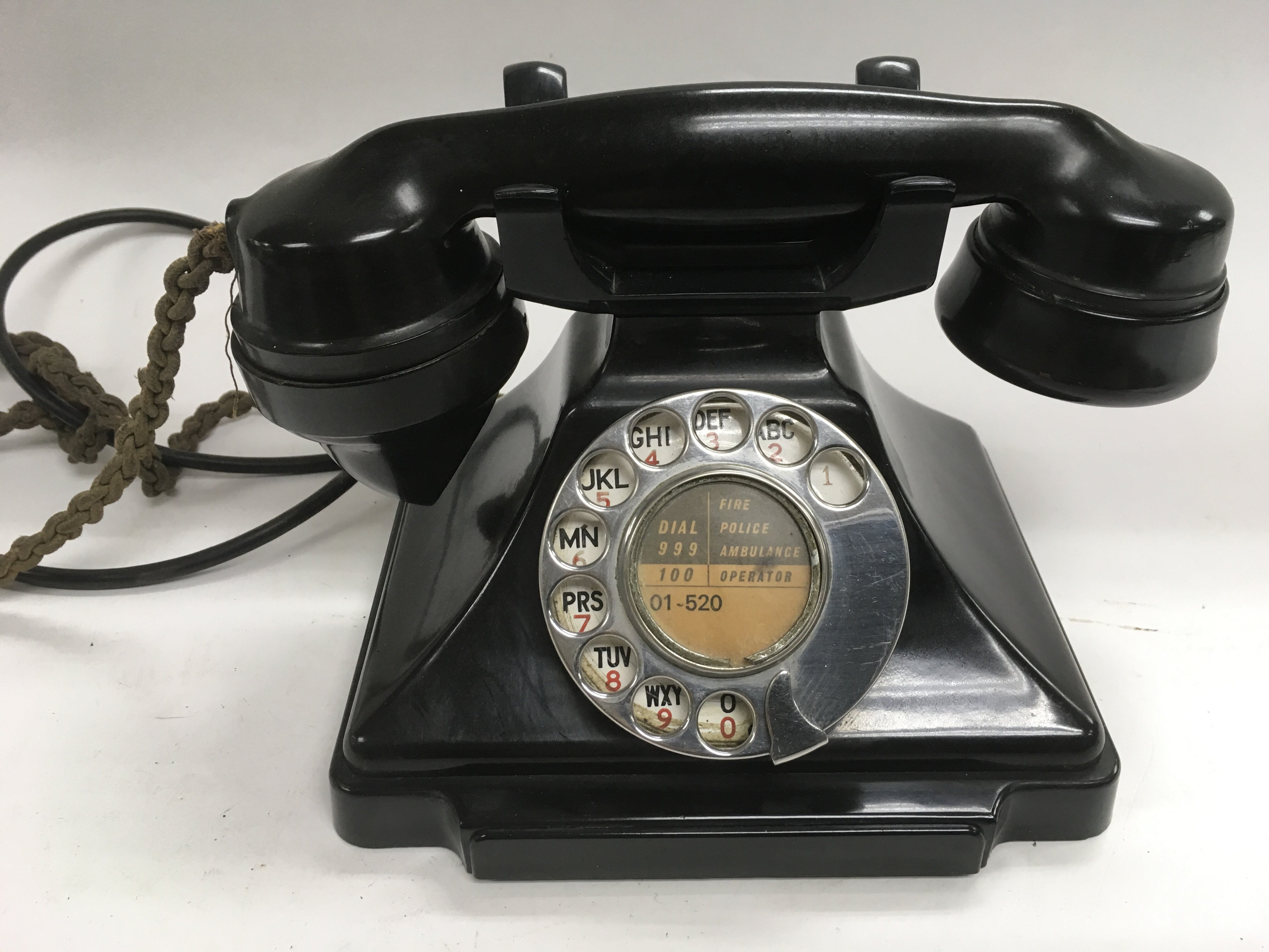 A circa 1930s bakelite telephone.