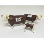 A Beswick figure of a Champion Hereford Bull and c