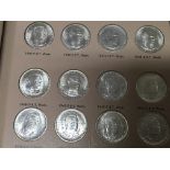 An American commemorative coin set of half dollars