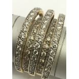 An 18ct gold five row ring, each set with diamonds