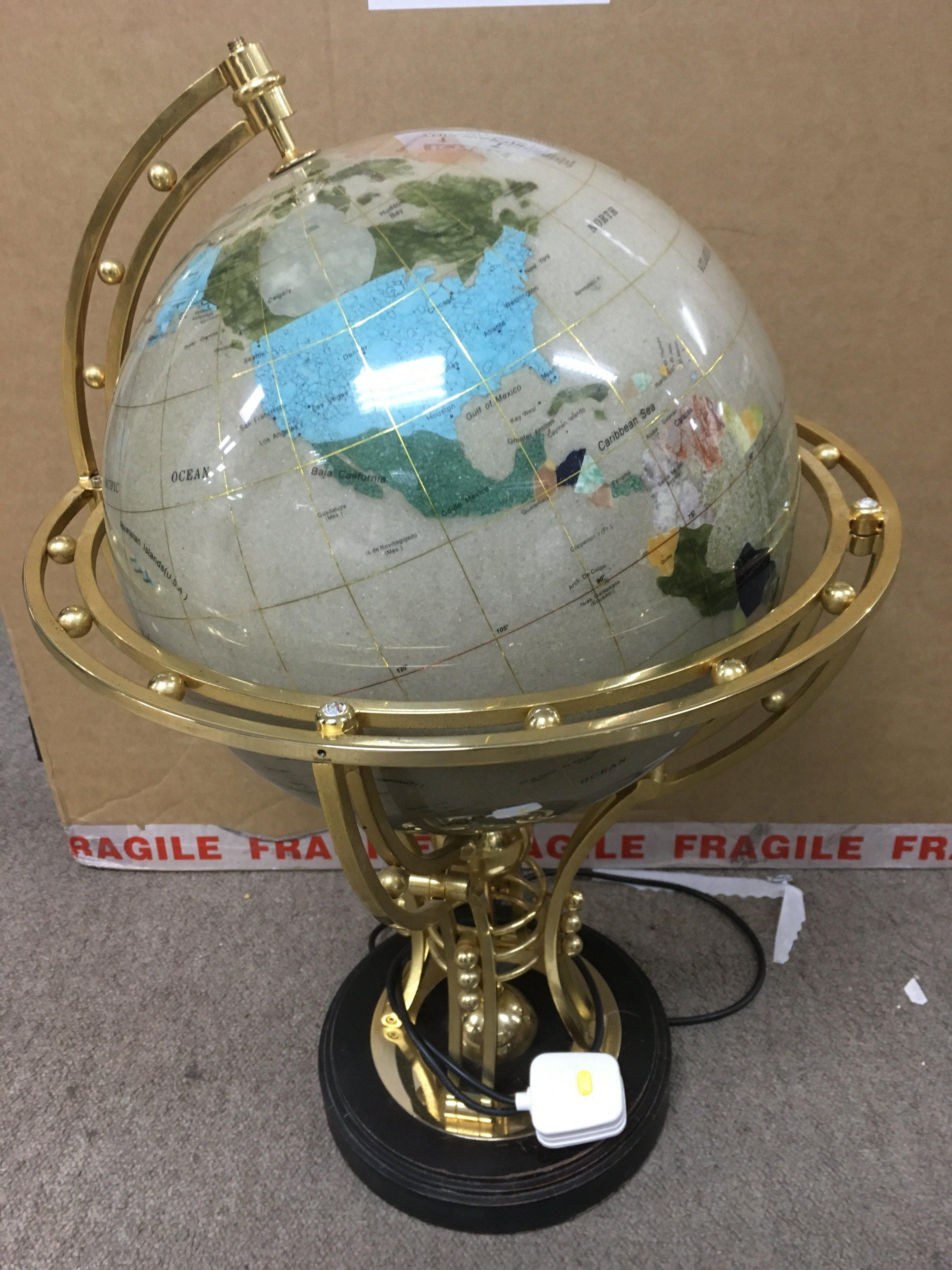 A large luminating, rotating specimen globe, approx height 65c