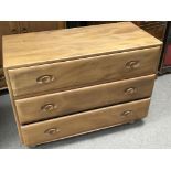 An Ercol type (no makers labels) light Elm chests of drawers with three drawers.