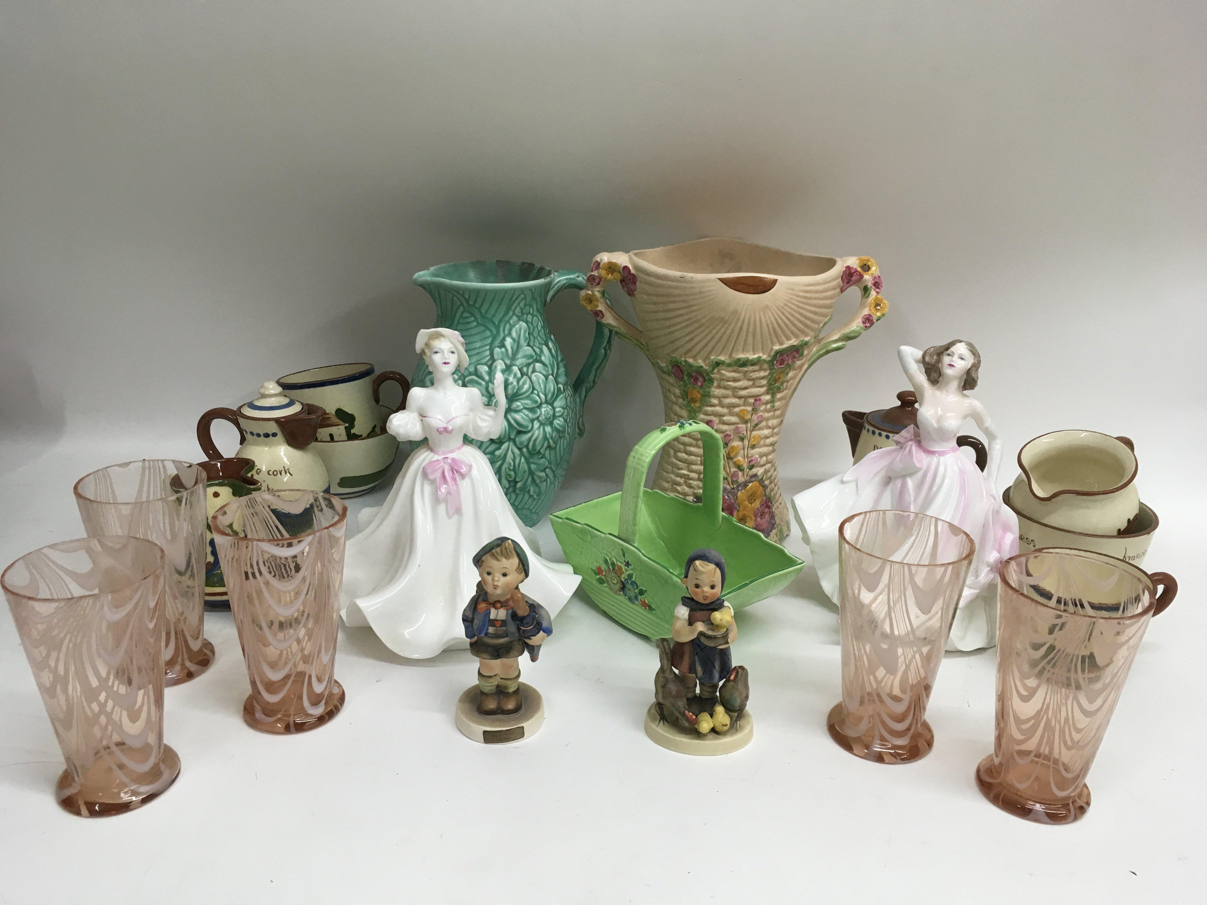 A group of ceramics including figurines and candy