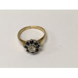 A 18 ct gold sapphire and diamond ring size j