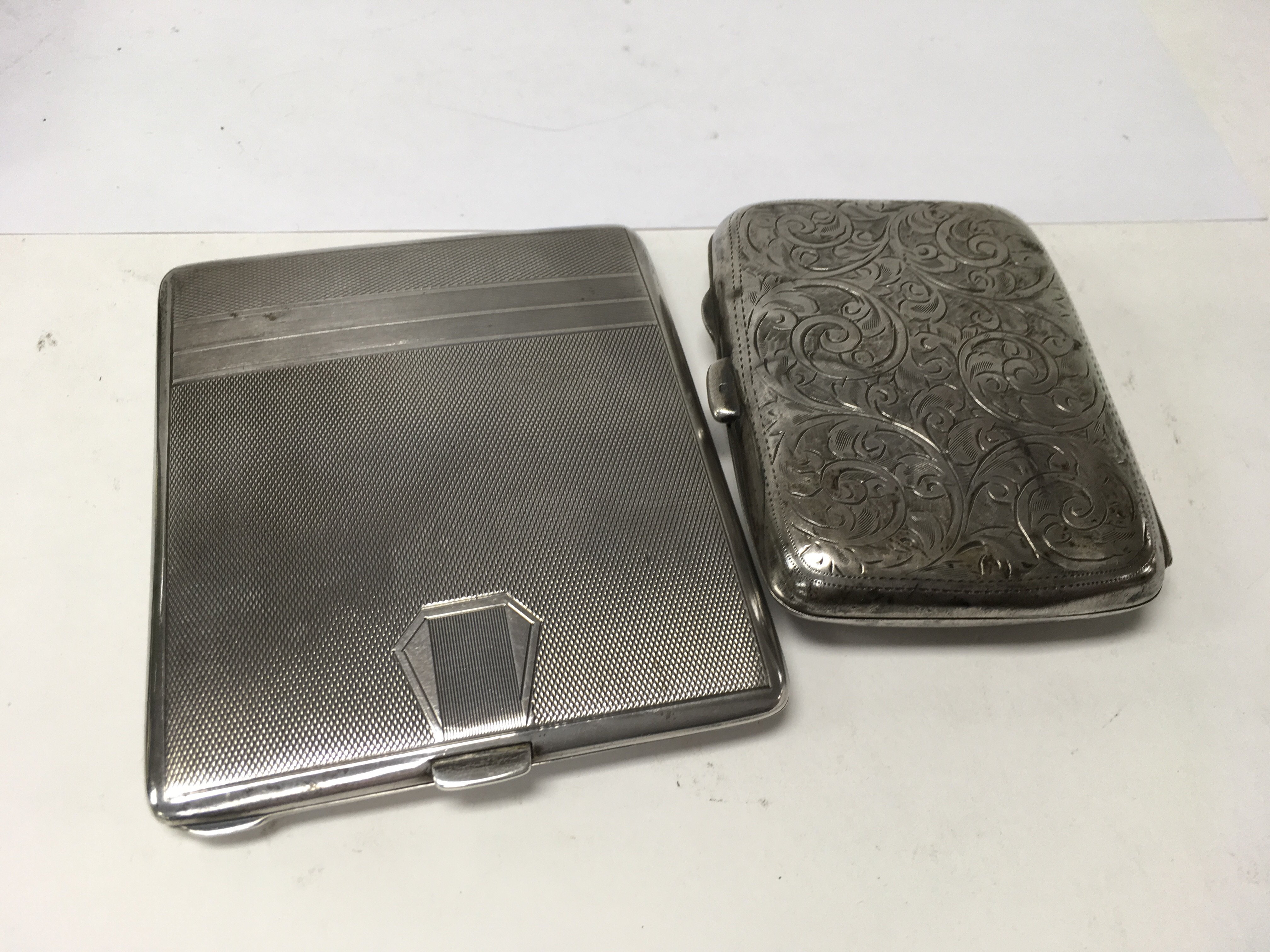 Two silver cigarette cases 190 grams