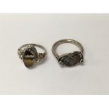 Two decorative silver rings
