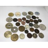A collection of world coins including American coi