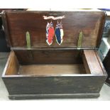 A sailor's wooden travelling trunk, the inside lid