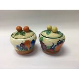 Two Clarice Cliff preserve jar and covers crocus a