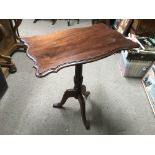 A mahogany occasional table with shaped top, appro