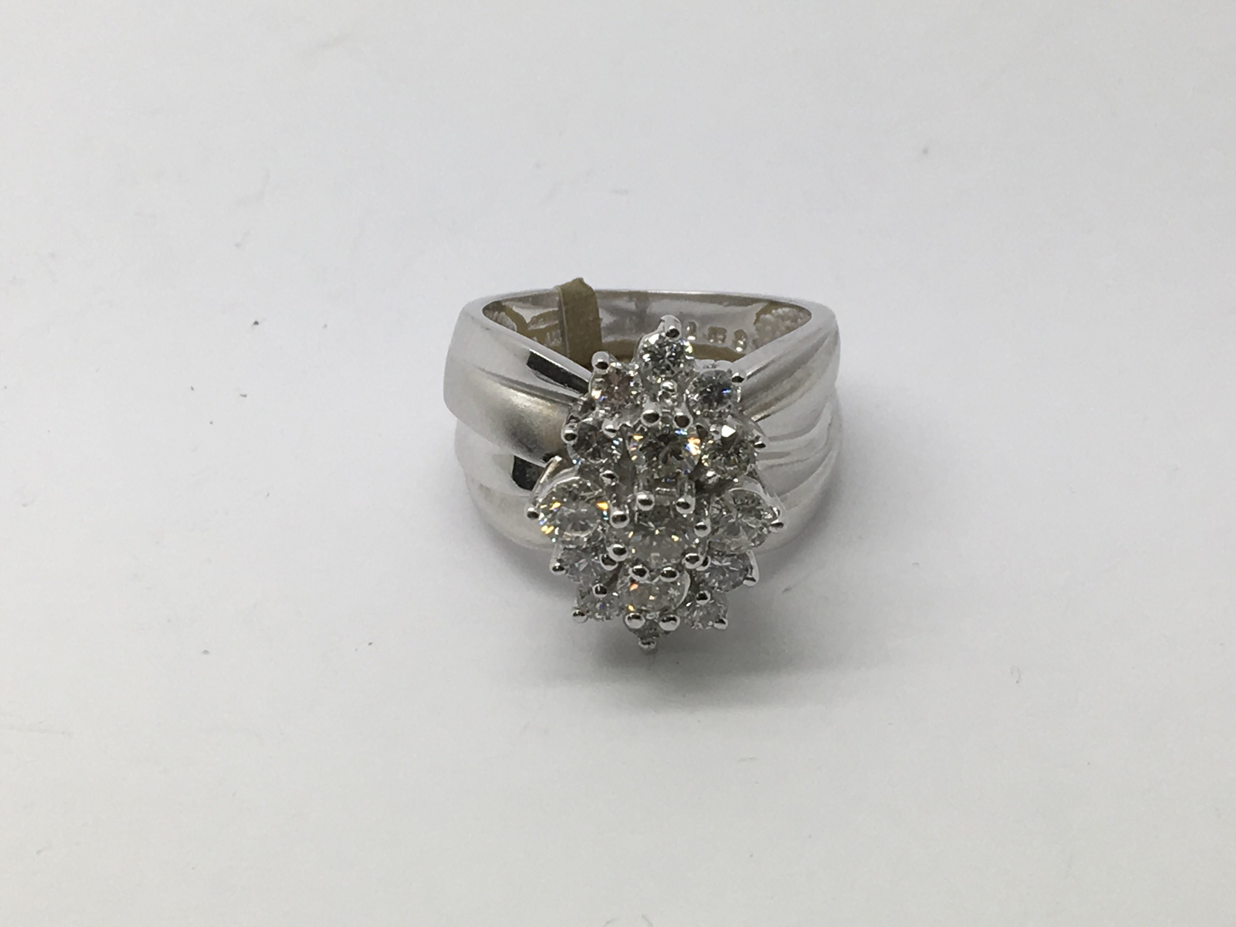 A good quality modern style diamond cluster ring s