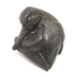 A small sculpture of an oystercatcher, in the mann
