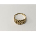 A 18 ct gold ring 5 grams approx