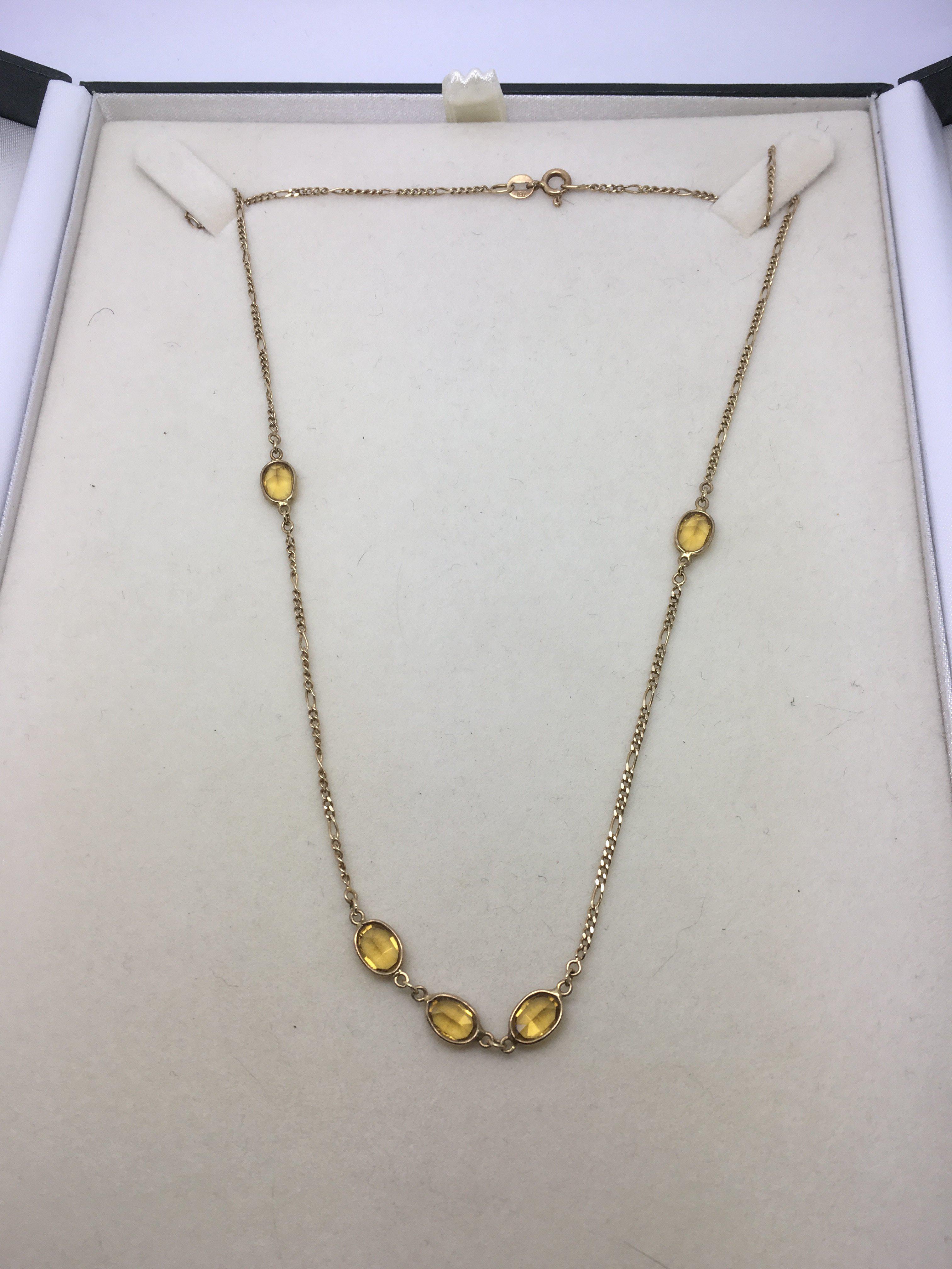 An 18ct gold and citrine necklace, approx 3.8g..