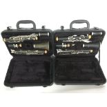 Two cased Blessing clarinets