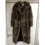 A full length brown fur coat - NO RESERVE