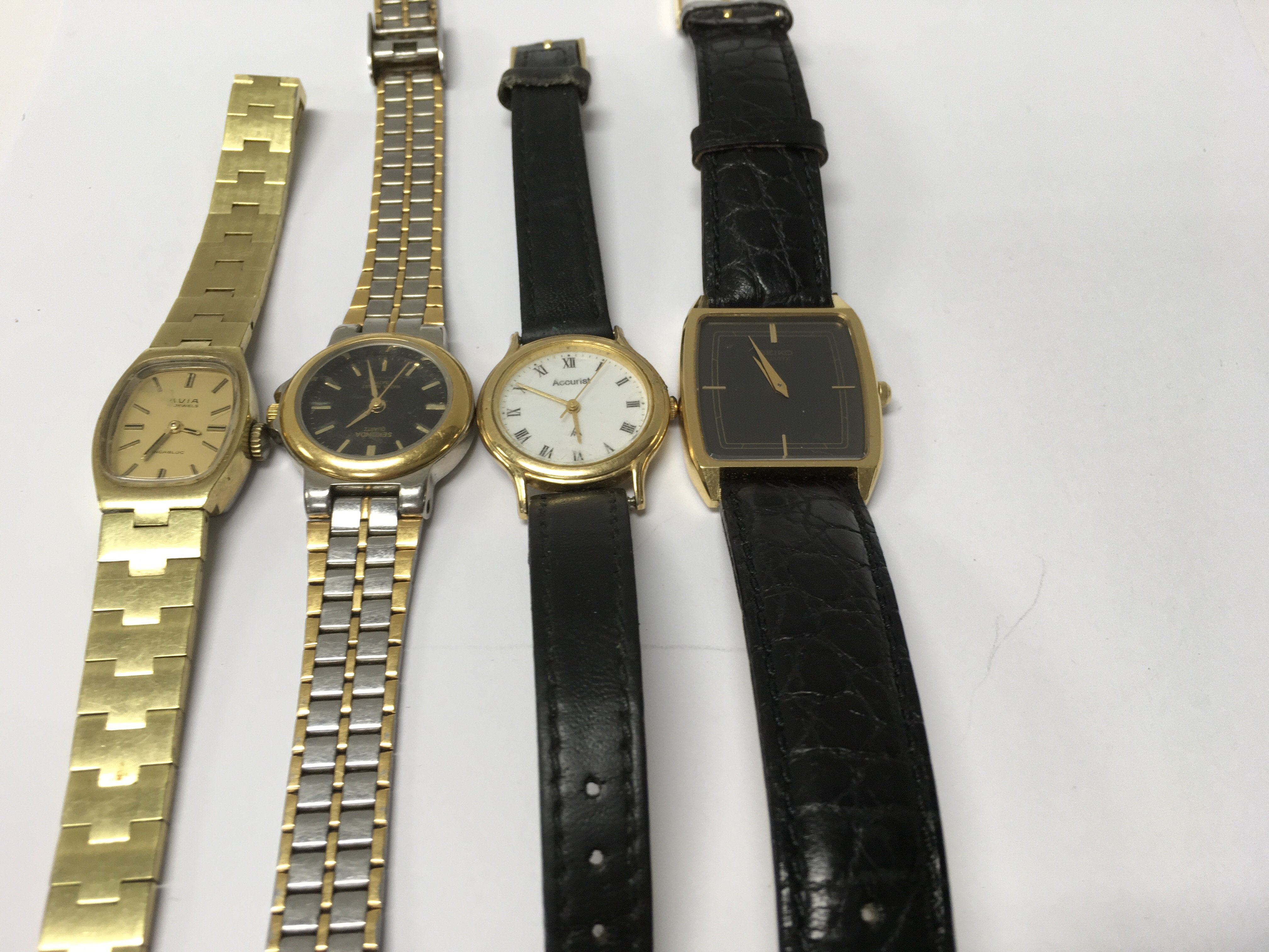 Four dress wristwatch