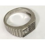 A gent's white gold and diamond set dress ring, 1/