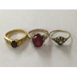 Two 9 ct gold rings And one unmarked ring