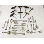A collection of corkscrews and silver plated cutle