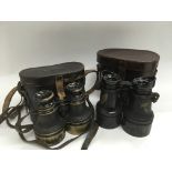 Two pairs of military binoculars, circa WW1.