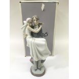 A boxed Lladro 'bride and groom' figure