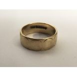A 9ct gold wedding band.Approx 3.52g