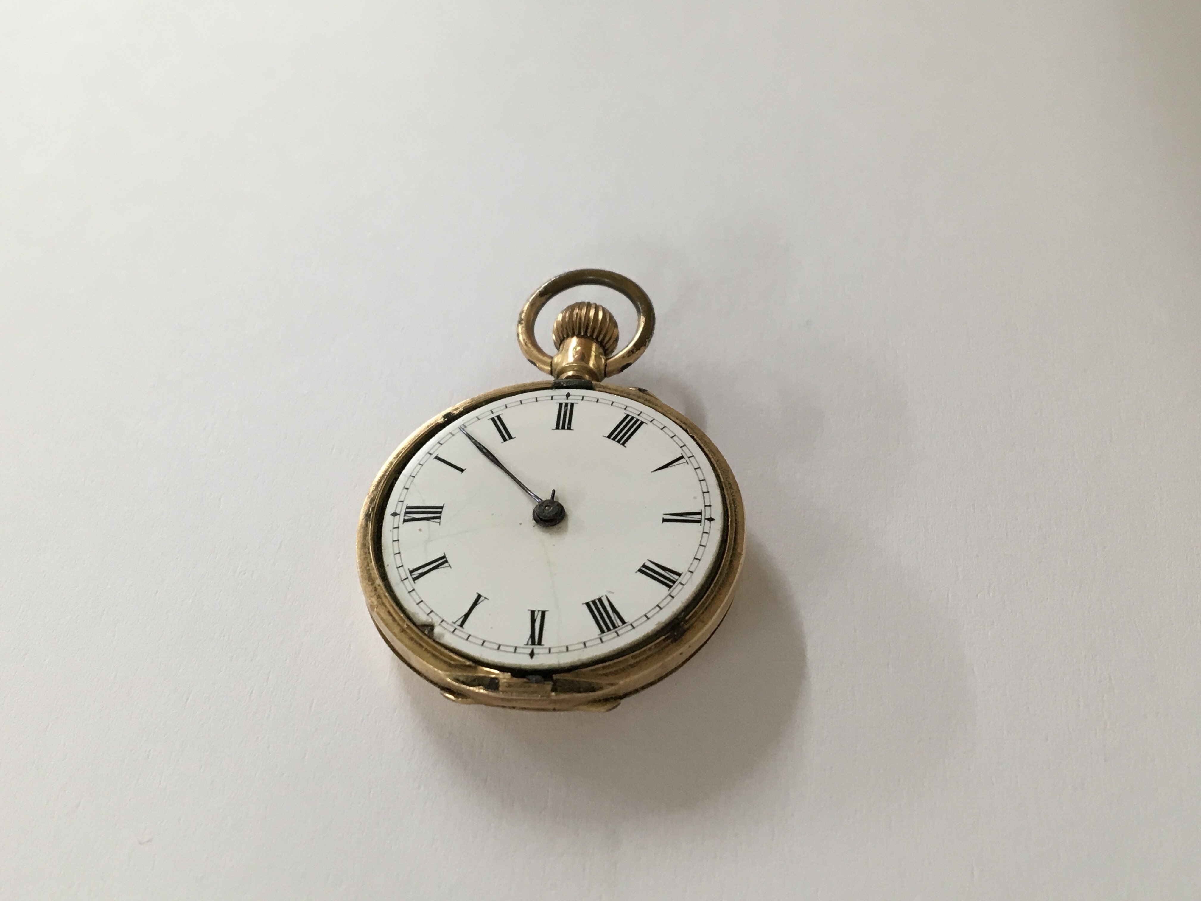 A small 14 ct gold fob watch with button wind move