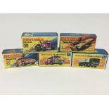 A collection of Matchbox Superfast cars in boxes.