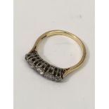 A 18ct gold and diamond set ring.Approx size P/Q,