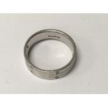 A platinum ring inset with diamonds 9 grams size o