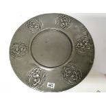 A large Liberty Tudor Style pewter charger of Art Nouveau design and of the period. Diameter 50cm.