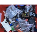 A box of loose Mega blocks building bricks