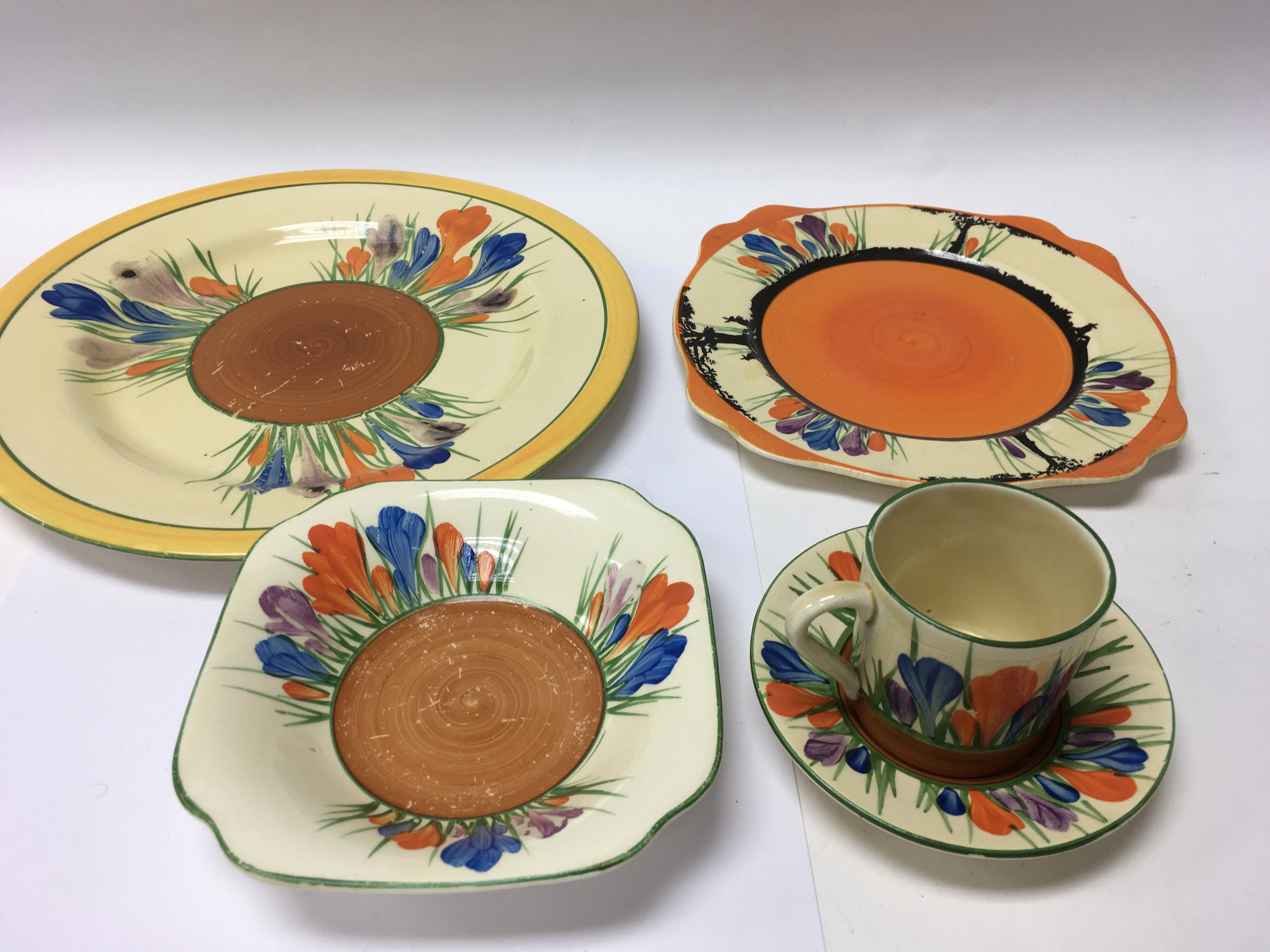 A collection of Clarice Cliff crocus pattern tea w