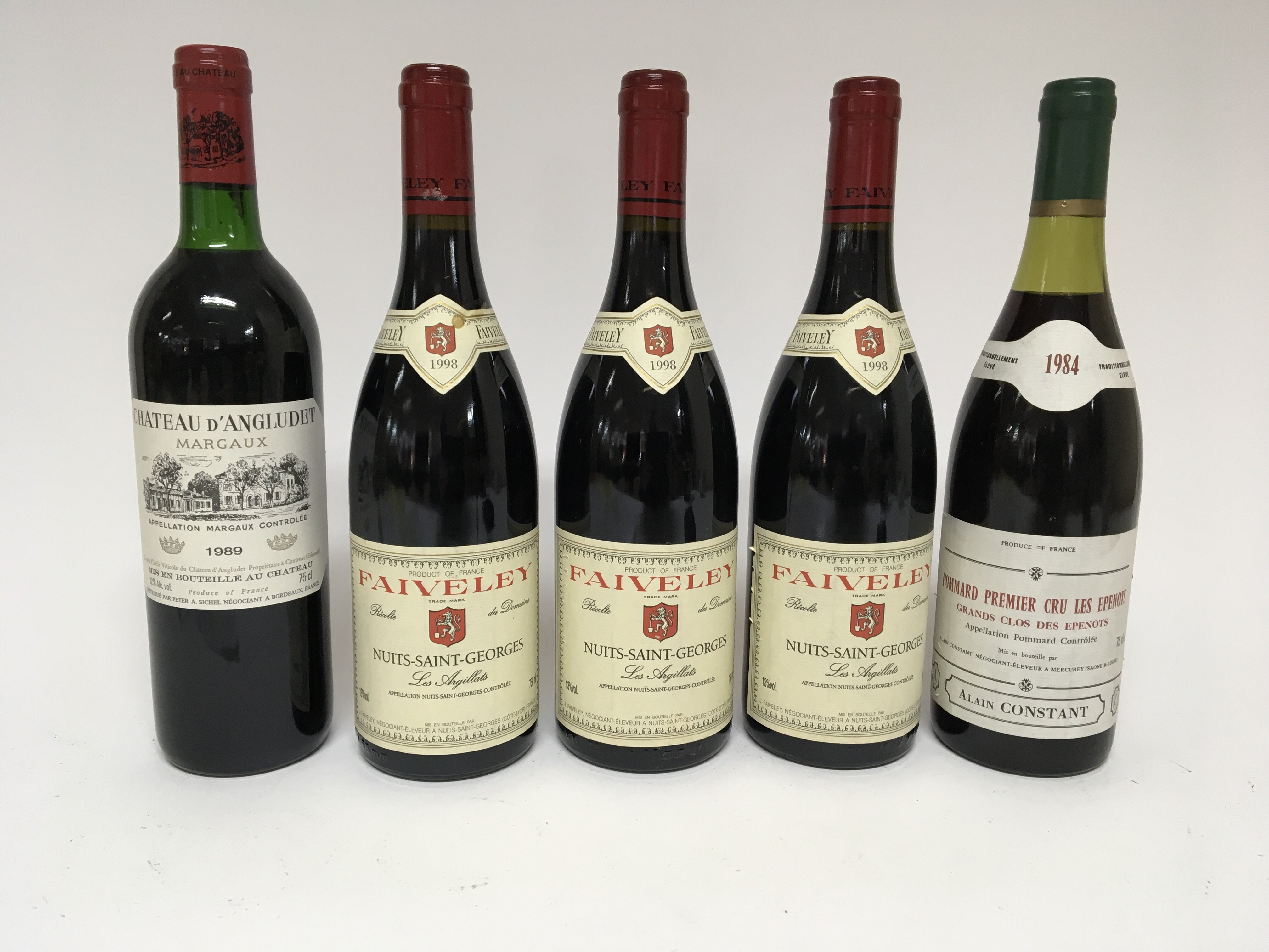 Five bottles of wine comprising chateau d Angludet