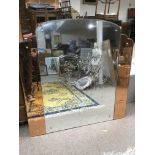A large Art Deco mirror engraved with nude maidens, approx 107cm x 107cm.