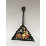 A Russian three string Balalaika decorated in the