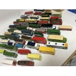 A collection of loose die cast buses and coaches,