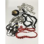 A collection of large costume necklaces and bracel
