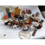 A box containing a collection of Dolls house furni