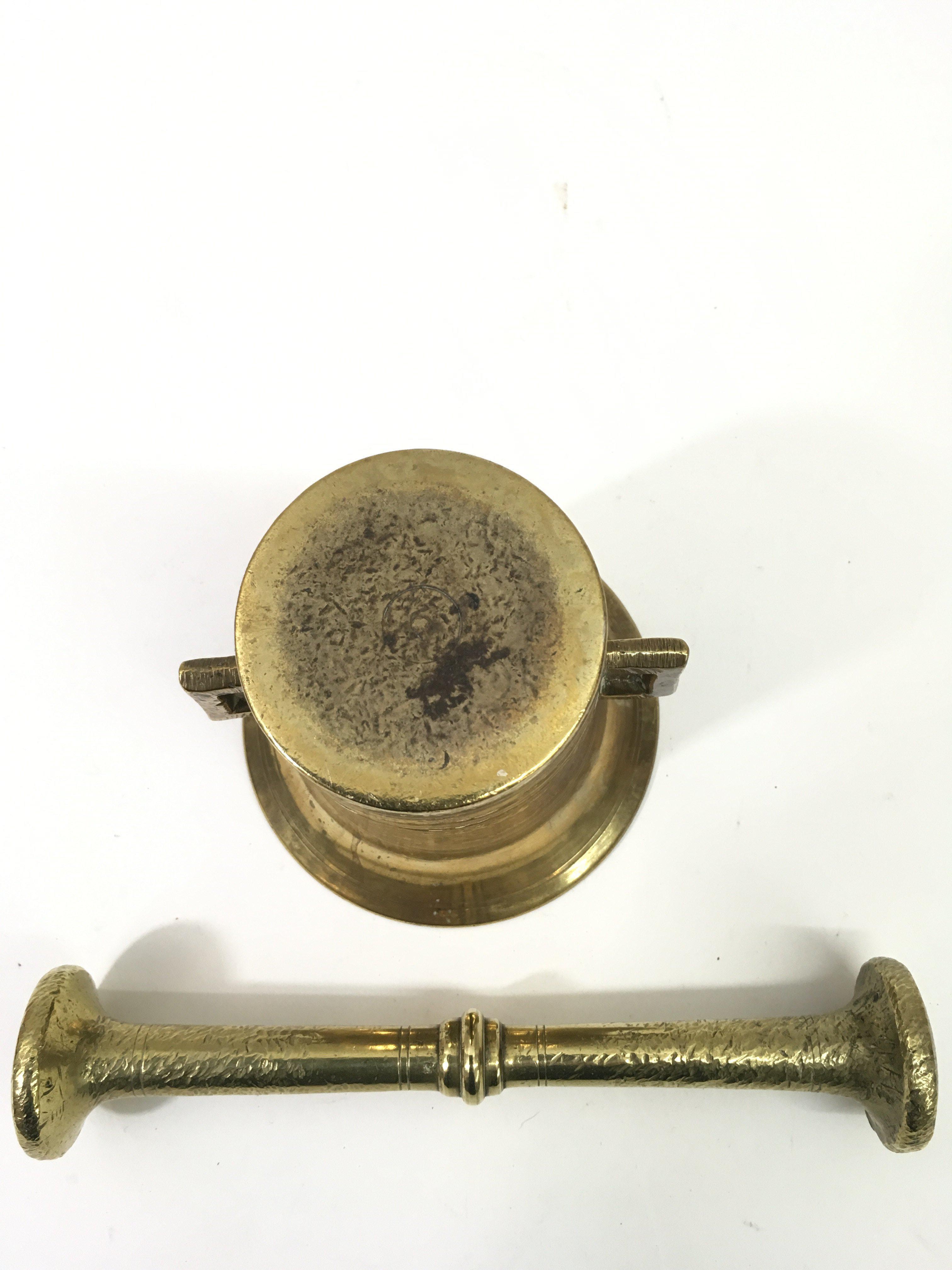 An oriental brass pestle and mortar.Approx 10cm hi - Image 2 of 2