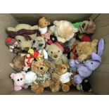 A large box of assorted plush bears and animals