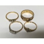 Four gold rings set with chip stone diamonds seed