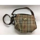 A Burberry style bag.