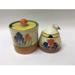 Two Clarice Cliff preserve pots decorated with cro