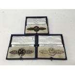 A group of three D Day fighter clasps, bronze, sil